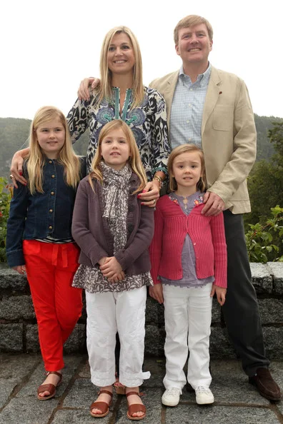 Prince Willem-Alexander, Princess Maxima and their daughters pose for the media, before spending the Christman holiday