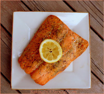 Grilled Cedar Planked Salmon, a healthy and flavorful dinner. Lightly marinated, then grilled on a cedar plank. | Recipe developed by www.BakingInATornado.com | #recipe #dinner #fish