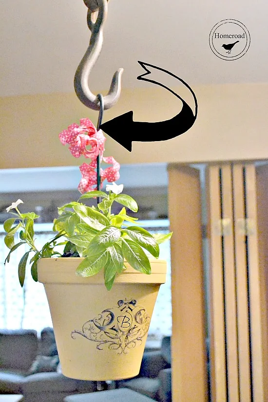 Wrought Iron Hanging Planter with a transfer