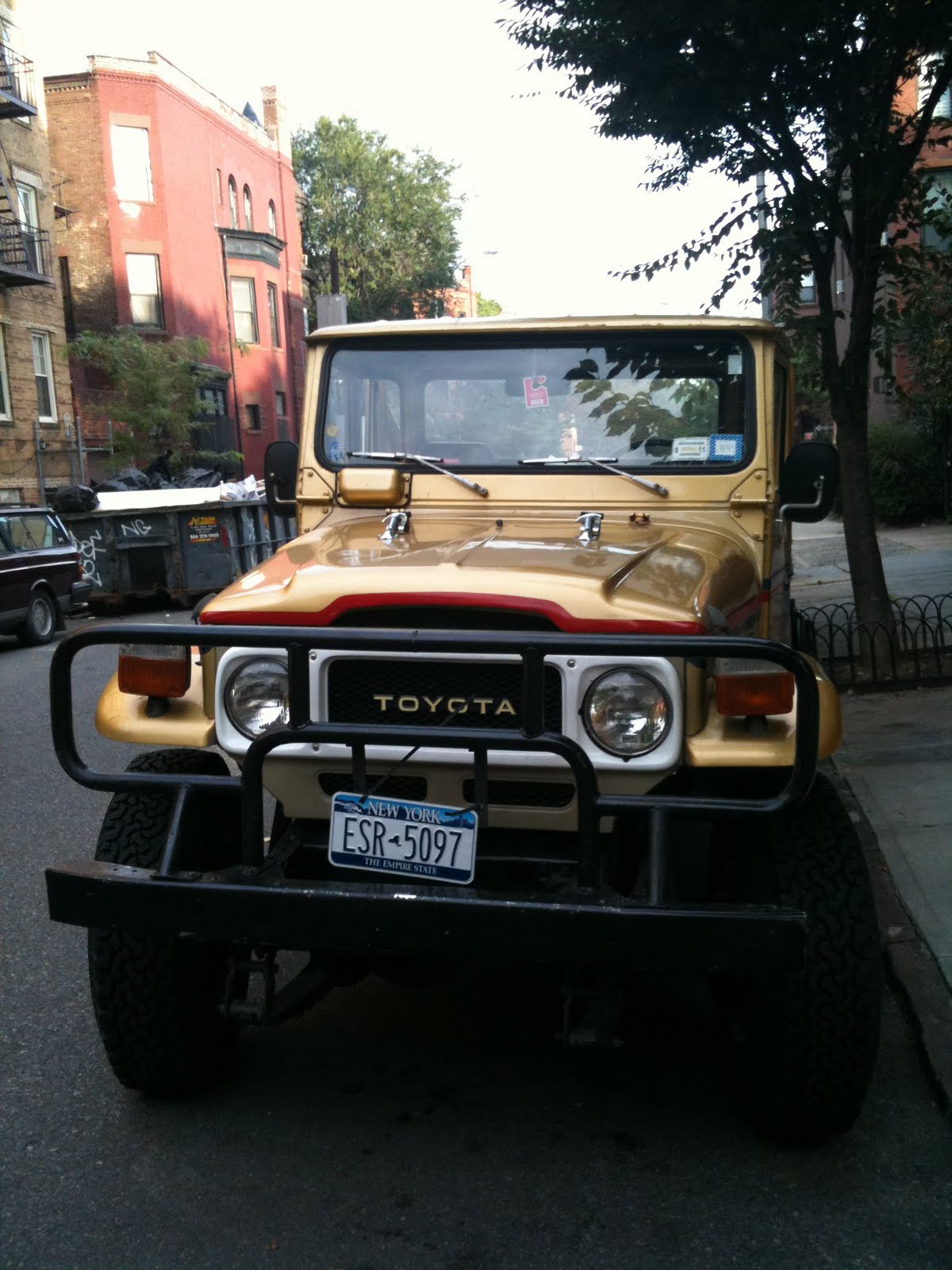 Cruisers Jeeps and Rovers Toyota FJ40 Land Cruiser Gold with Wood Flatbed