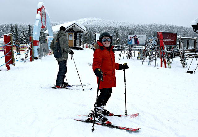 Young Skier Posing in Full Ski Wear