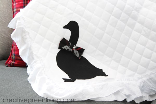 Goose applique on a blanket with a ruffle - easy farmhouse style upcycled blanket project