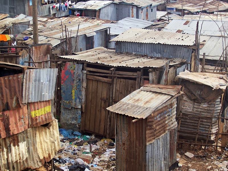 Kibera, The Nairobi neighborhood of Kibera, Africa's largest urban slum, in which around 1 million people live in close-packed tin shacks.