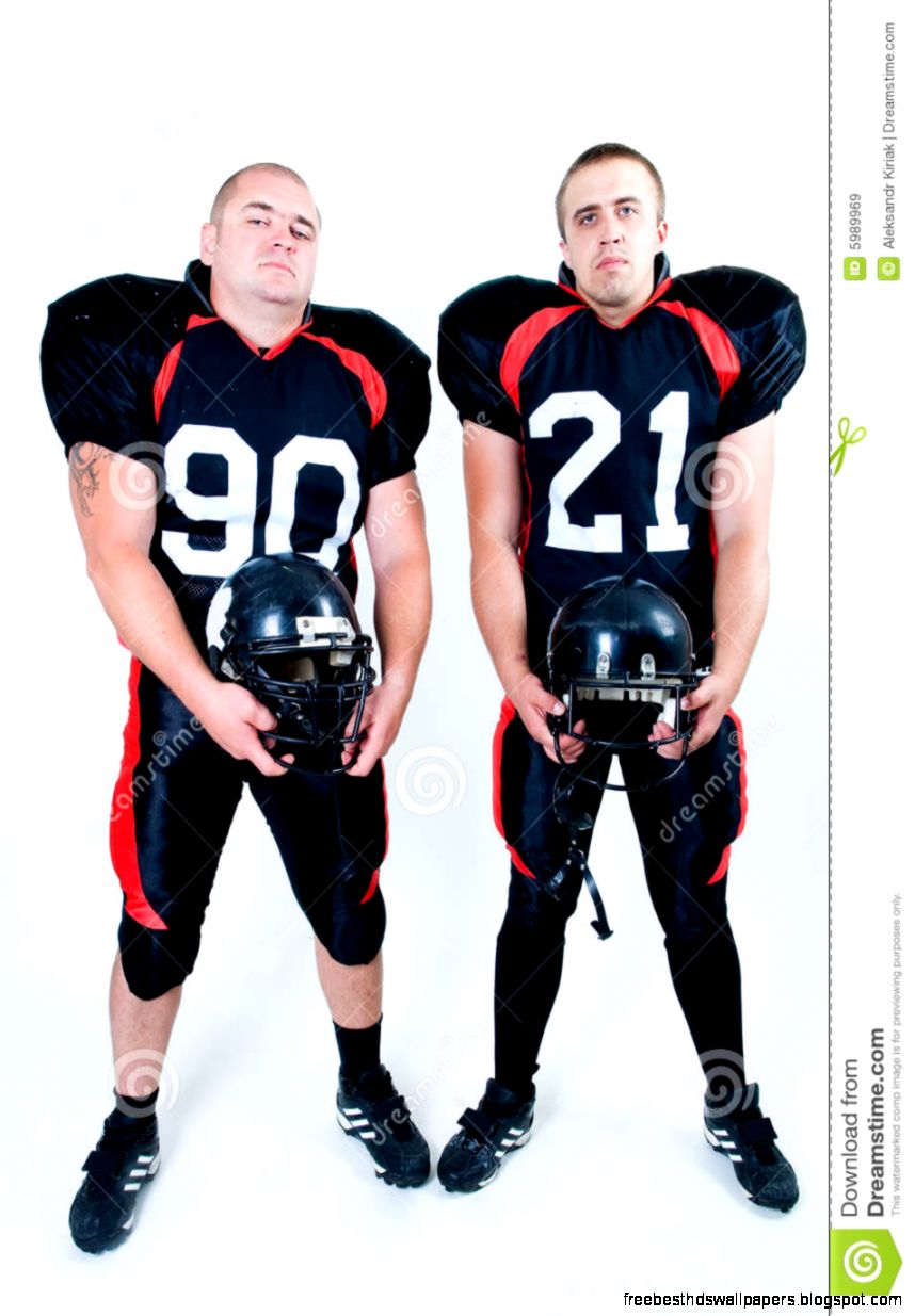 American Football Players Holding Helmets Royalty Free Stock