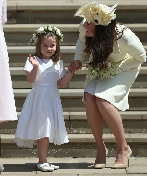 Markle wore a silk organza boat neck long sleeve wedding dress designed by famous British designer Clare Waight Keller.