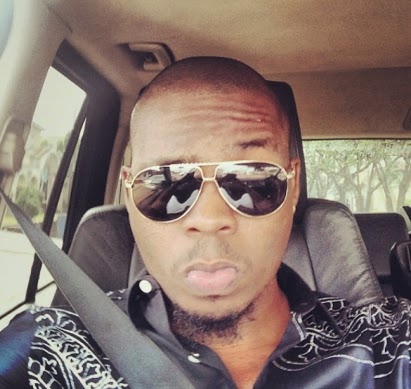 olamide dropped out school