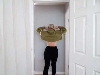 back view of over sized green crop hoodie