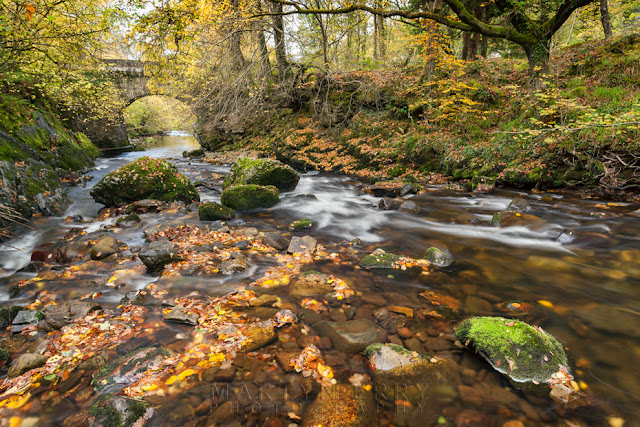 The Afon Mellte in the Brecon Beacons with small arched bridge by Martyn Ferry Photography