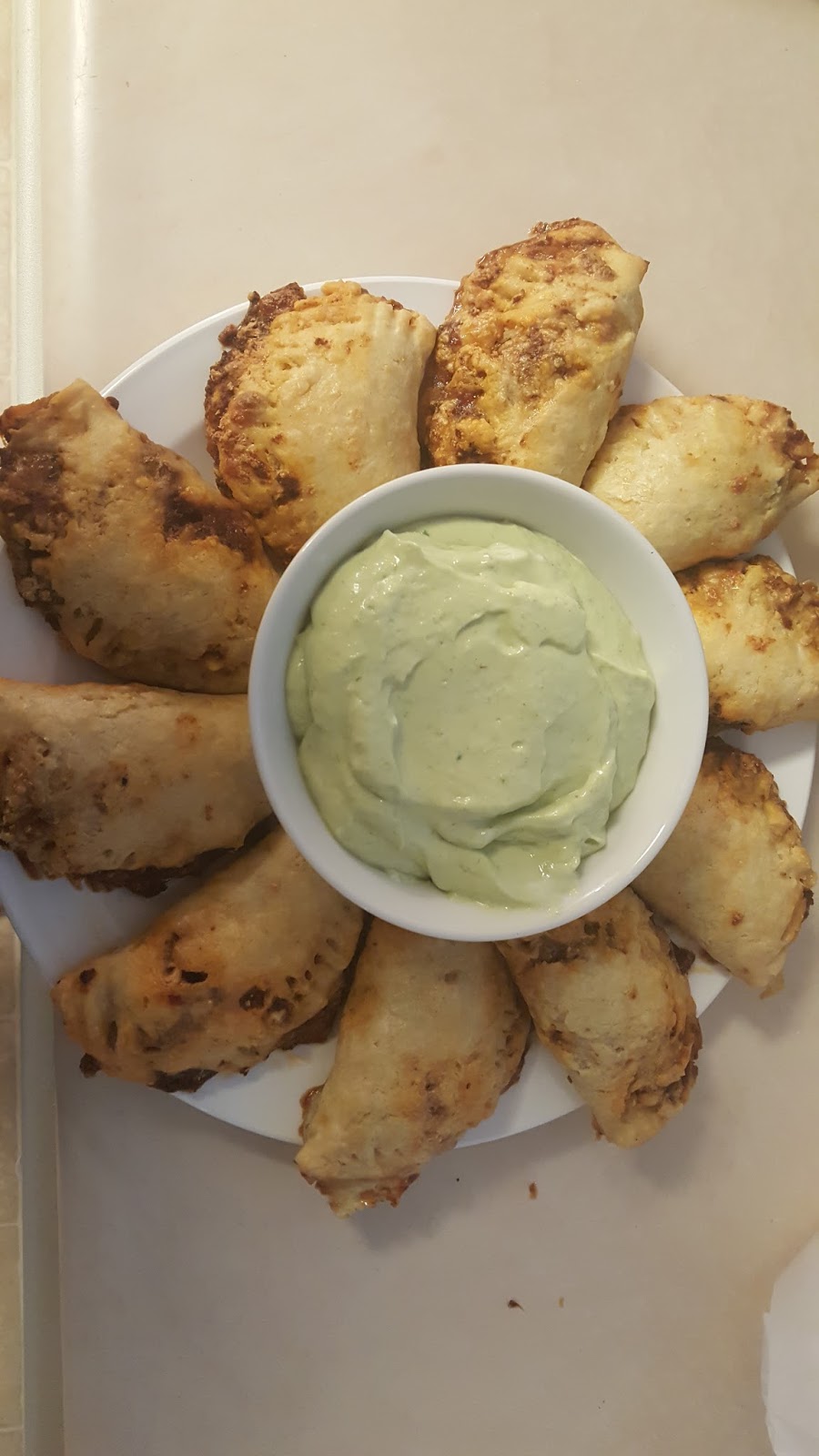 Under the Red Fedora Chorizo Bacon Empanadas with an Avocado Sour