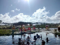 Banho de rio na praia naturista de Massarandupió - Bahia