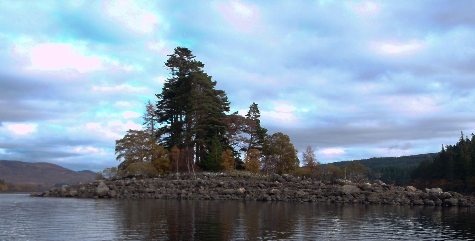 Mountain and Sea Scotland Reflecting on Loch Laggan