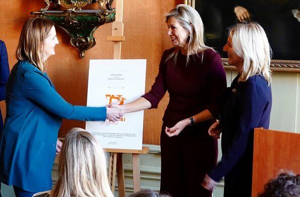 Queen Maxima visited Museum Van Loon, and VU University. The Queen wore a burgundy sweater and pants by Natan