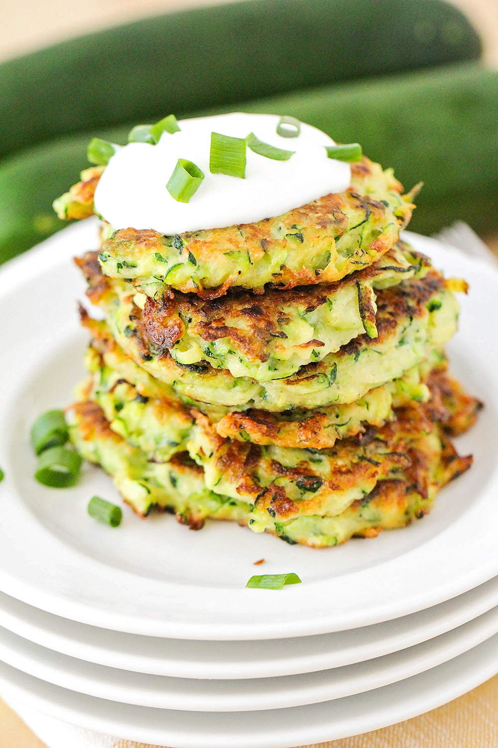 These delicious and savory zucchini fritters are the perfect summer side dish!