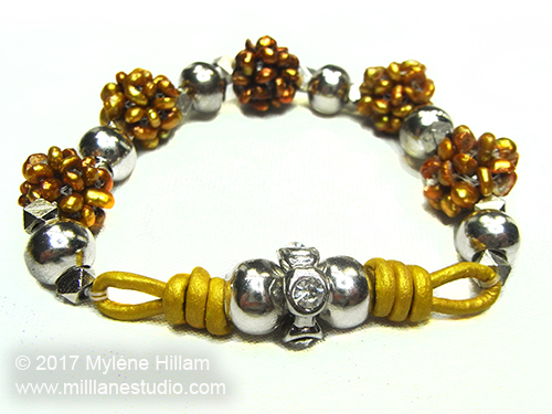Stretch Magic cluster pearl bracelet with leather cord infinity loop focal