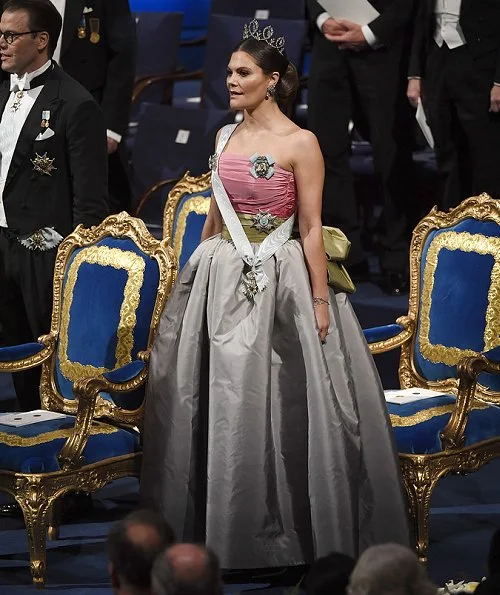 Queen Silvia, Prince Daniel, Prince Carl Philip. Princess Sofia wore a red dress. Crown Princess Victoria wore her mother's gown