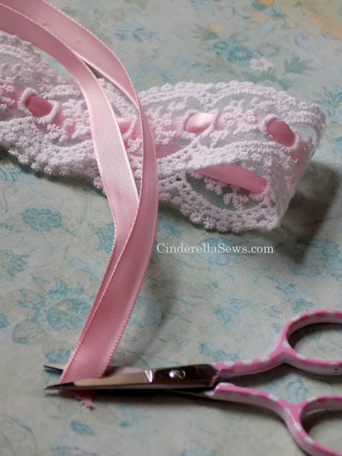 Make your own lace choker necklace for a Lolita Fashion outfit, Marie Antoinette costume, or super feminine necklace. A few stitches, pearls, crystals, and lace makes a lovely accessory for cosplay or weddings #lolita #lolitafashion #diyjewelry #sewing #beginnersewing