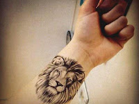 Simple Small Lion Head Tattoo