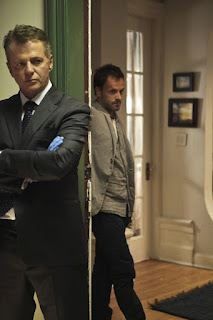 Jonny Lee Miller and Aidan Quinn as Sherlock Holmes and Captain Gregson in Elementary Pilot Episode Jonny Lee Miller and Aidan Quinn as Sherlock Holmes and Captain Gregson in Elementary Pilot Episode
