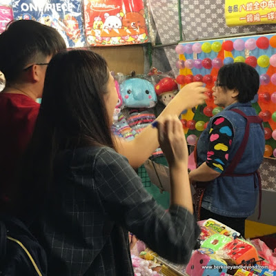 balloon arcade game at Shilin Night Market in Taipei, Taiwan balloon arcade game at Shilin Night Market in Taipei, Taiwan
