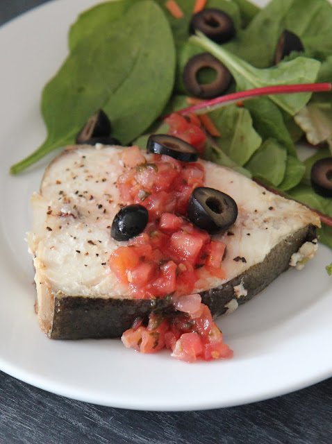 Have you tried Alaska seafood lately? See the delicious dish we made using wild-caught halibut. This simple baked fish is topped with fresh salsa and olives!