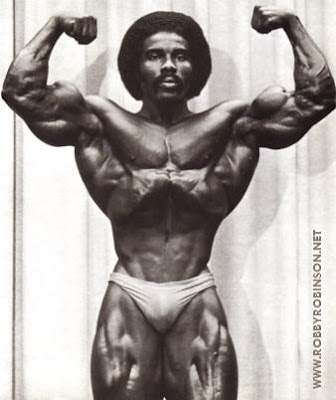 ROBBY ROBINSON - FRONT DOUBLE BICEPS VACUUM - CONTEST POSING 70s Read about RR's training and life experience, about other legends of Golden Era  of bodybuilding and what really happened behind the scenes of Weider's empire  - in RR's BOOK "The BLACK PRINCE; My Life in Bodybuilding: Muscle vs. Hustle" -  ▶ www.robbyrobinson.net/books.php