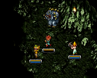 Crono, Marle, and Lucca battle Heckran, the master of Heckran Cave in Chrono Trigger.
