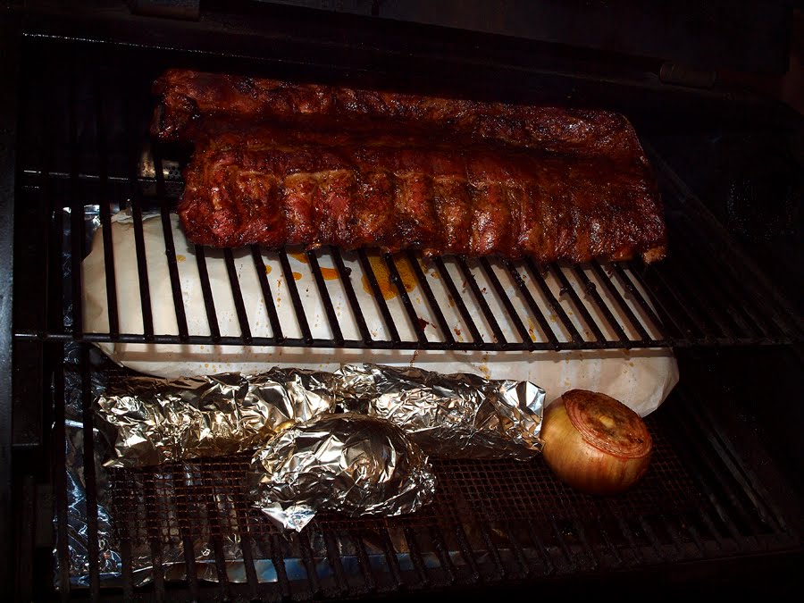Pellet Smoker Cooking Pork Back Ribs in Parchment Paper