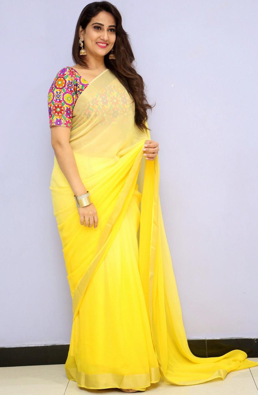 Glamours Telugu TV Anchor Manjusha Photos In Traditional Yellow Saree