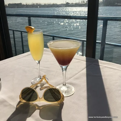 mimosa and Eve's Sunset cocktails at Eve’s Waterfront Restaurant in Oakland, California