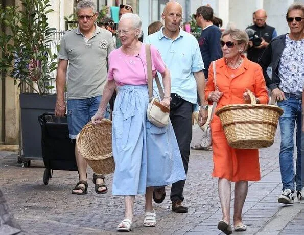 Danish Queen Margrethe visited an open-air market which is in the square outside Cahors cathedral