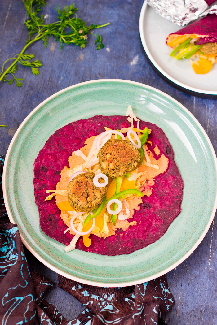 Baked chickpea falafels and hummus in a beetroot flatbread