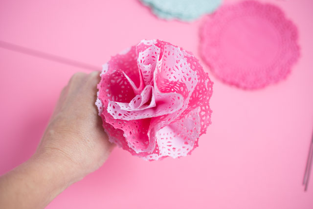 These mason jars filled with doily flowers are a pretty DIY Valentine's Day decoration or centerpiece! #valentinecrafts #valentinescrafts #masonjarcrafts #doilycrafts #doilyflowers #paperflowers #valentinesdaycrafts These mason jars filled with doily flowers are a pretty DIY Valentine's Day decoration or centerpiece! #valentinecrafts #valentinescrafts #masonjarcrafts #doilycrafts #doilyflowers #paperflowers #valentinesdaycrafts