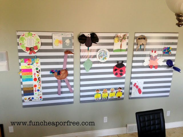 Kids' artwork hanging on boards, from Fun Cheap or Free
