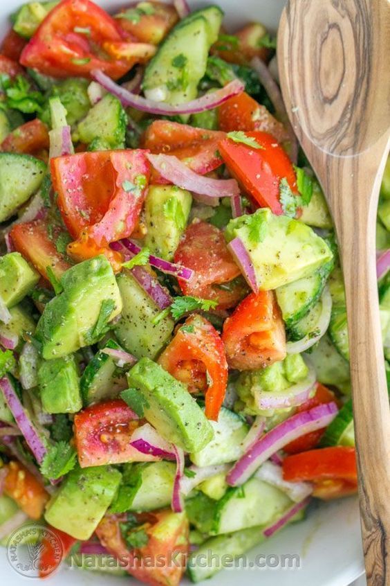 This Cucumber Tomato Avocado Salad recipe is a keeper! Easy, Excellent Salad | NatashasKitchen.com #recipe
