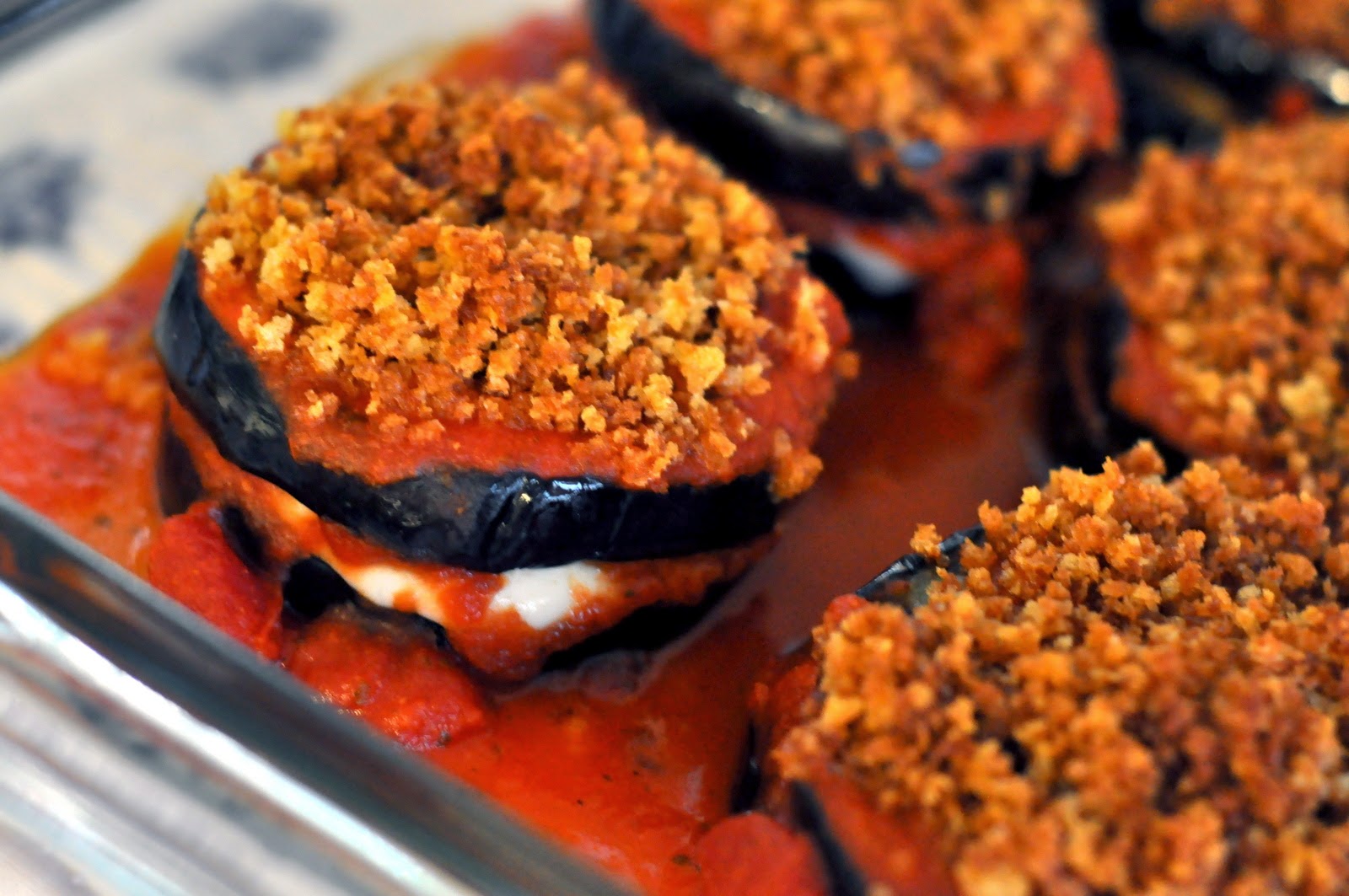 Eggplant Parmesan Stacks in Baking Dish with Tomato Sauce | Taste As You Go