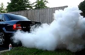 White smoke Thick white smoke being emitted by a vahicle