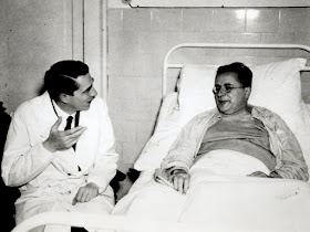 Togliatti, pictured with the surgeon, Pietro Valdoni, who saved his life, recovers in hospital after the assassination attempt.