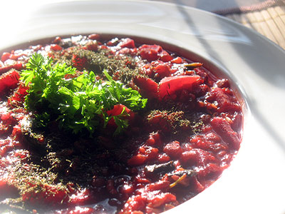 lentil bean pomegranate stew with beat and spinach