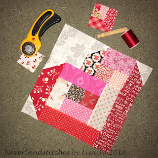 "Scrappy Log Cabin Heart" is a Free valentine's Day Quilt Block Pattern designed by Lisa Jo Girodat of from Neverland Stitches!