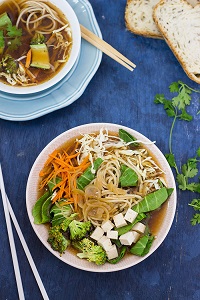 Vegan healthy soup made with white miso, wholewheat noodles and fresh vegetables