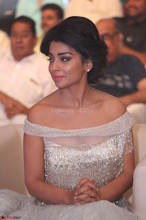 Shriya Saran in Stunning White Off Shoulder Gown at Nakshatram music launch ~  Exclusive (3)