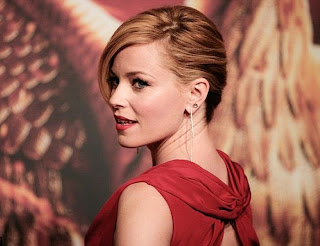 We could get lost in our eyes, despite Elizabeth Banks was hypnotized us in her close and personal dress for Hunger Games premiere. The 40-year-old strolled into the red carpet in a gorgeous red long gown to the event at Berlin, Germany on Tuesday, November 11, 2014! Thanks to her backless region.