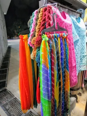 Where to Shop in Hyderabad: colorful scarves at Shilparamam crafts market