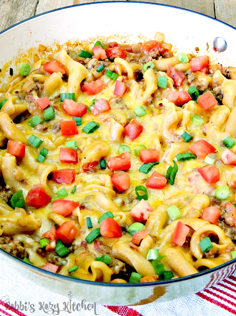 One Pot Cheeseburger Macaroni - Toss that box in the trash! This Cheeseburger Macaroni is done in less than 30 minutes, and tastes 100 times better! From www.bobbiskozykitchen.com