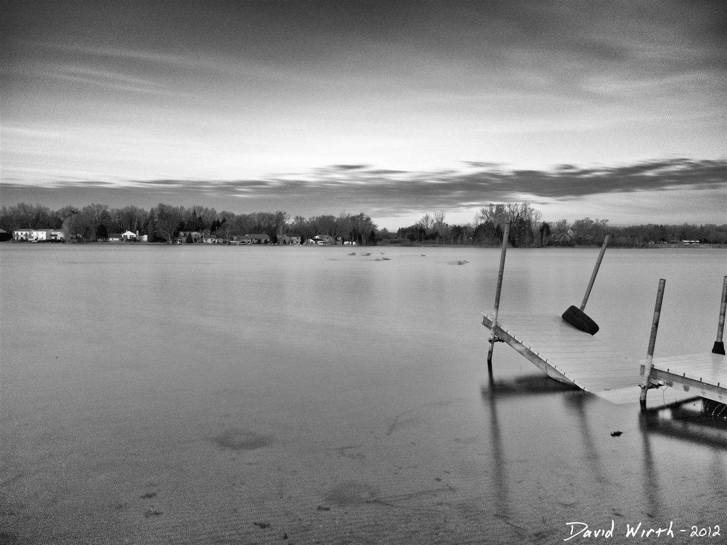 ND filter at the lake, calm lake water, smooth, dock, black and white, effect, photography