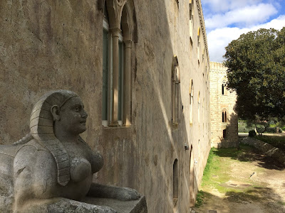 Views of Castello di Donnafuggata including stone sphinx. 