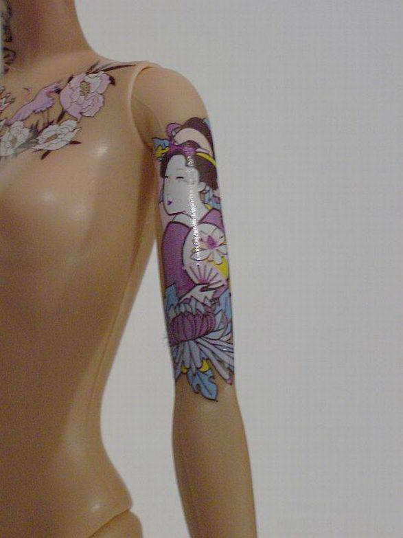 News Feed: Popular Tattooed Barbie Doll Photos
