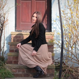 biker jacket and long pleated skirt