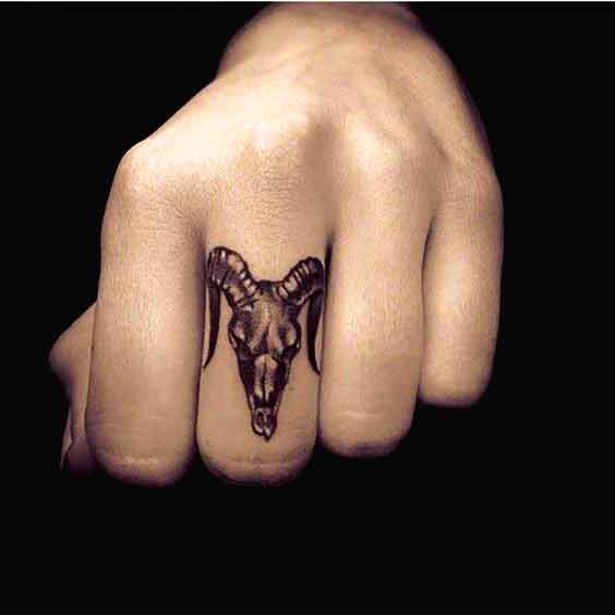 Best aries tattoos on finger