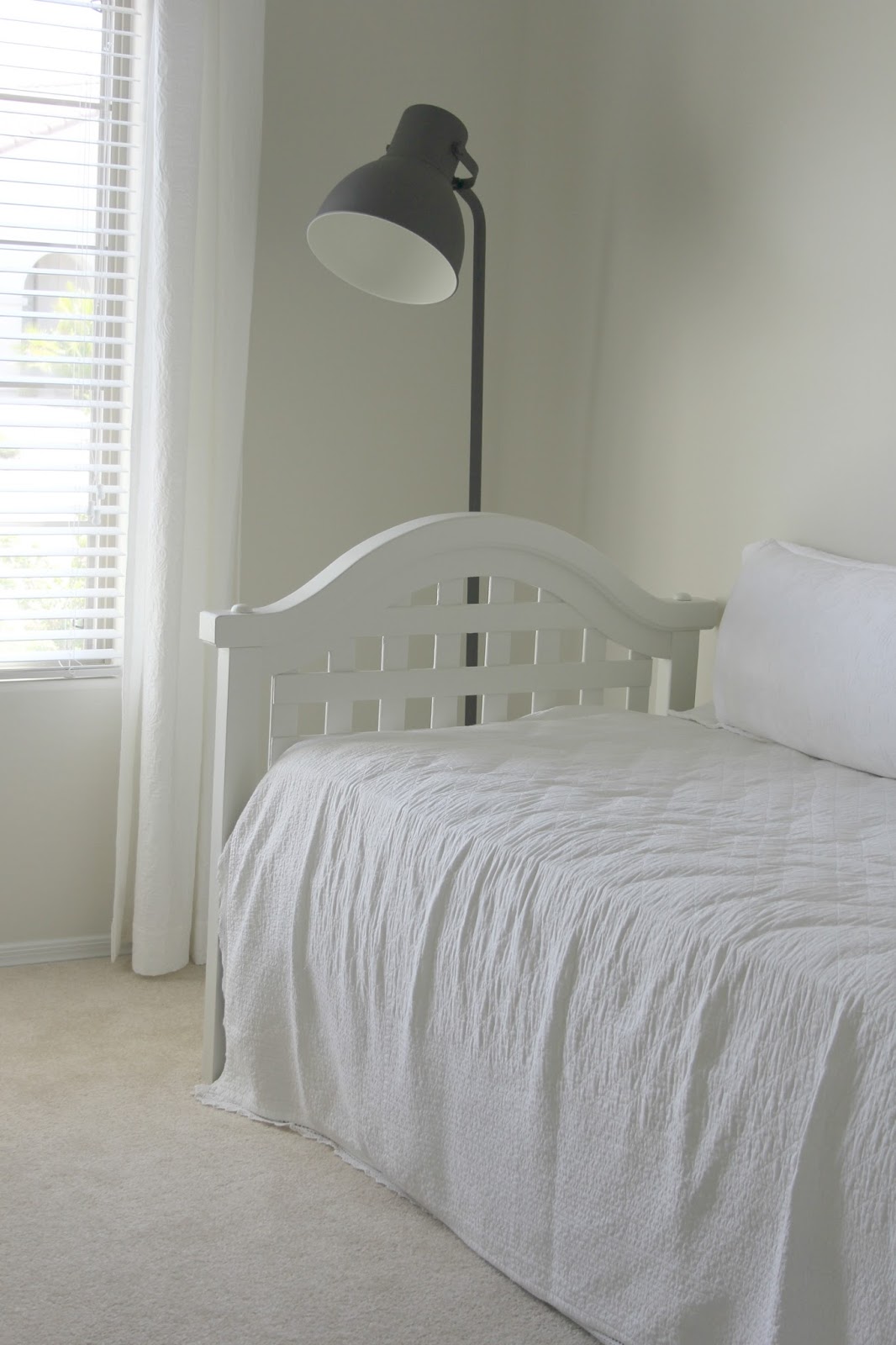 Vintage white daybed with modern industrial Hektar Ikea lamp by Hello Lovely Studio